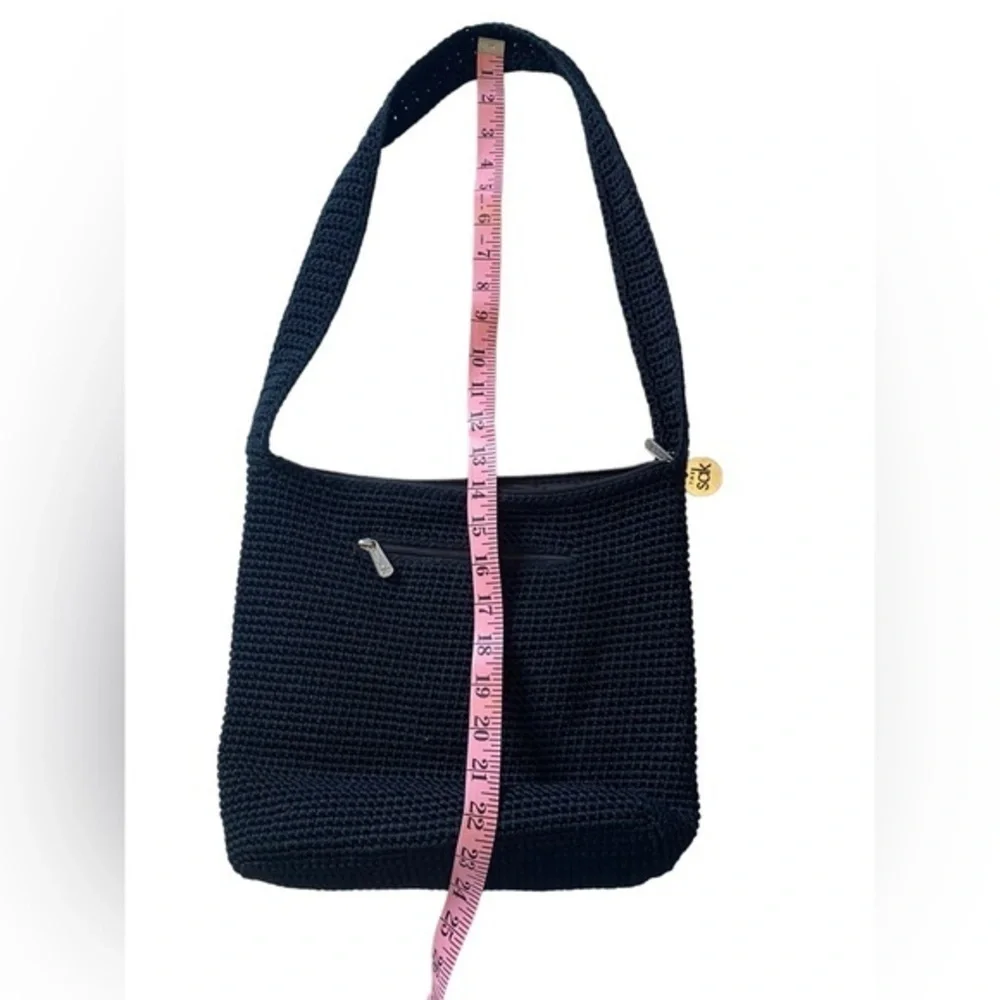 The SAK black woven crochet knit shoulder bag purse excellent condition
